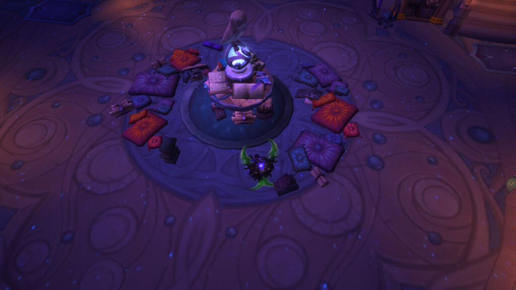 WoW a night elf sits in front of an owl statue